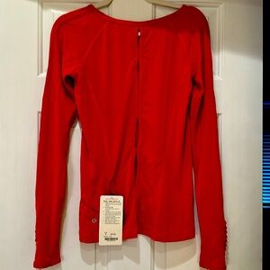 Brand new size 4 Lululemon long sleeve. Anti stink and moisture wicking material